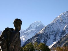 Sir Edmund Hillary, Climber, Adventurer and New Zealand Hero, Dead at 88 A man standing on top of a snow covered mountain