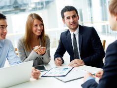 Advice for Newcomers Pt1 A group of people sitting at a table