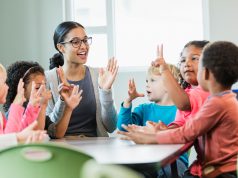 Advice for Newcomers p2 A group of people sitting at a table