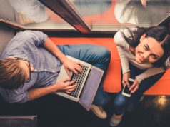 Money in Guaraní – Money in Guaraní A man lying on a laptop